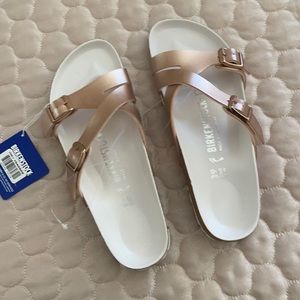 Birkenstock’s rose gold size 39 never worn